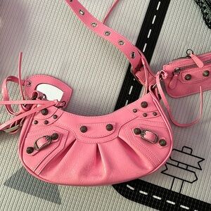 Pink crescent crossbody bag